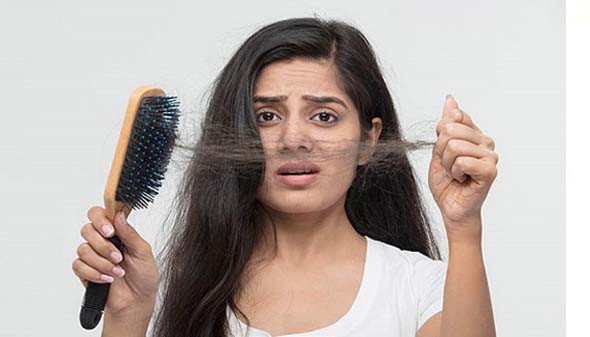 মাথার চুল ঝরে পড়া কি থামানো সম্ভব?